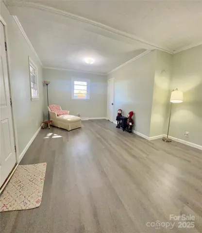 a living room with furniture and a lamp