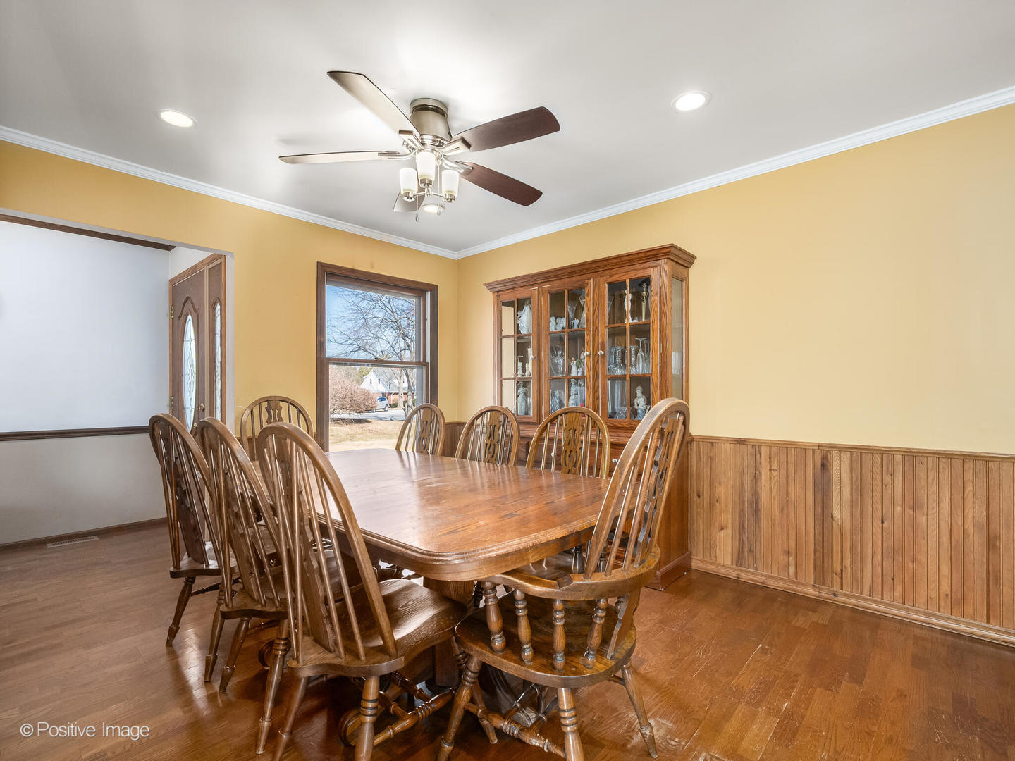 130 West End Road Roselle, IL 60172 - Photo 9 of 27 a view of a dining room with furniture and a chandelier