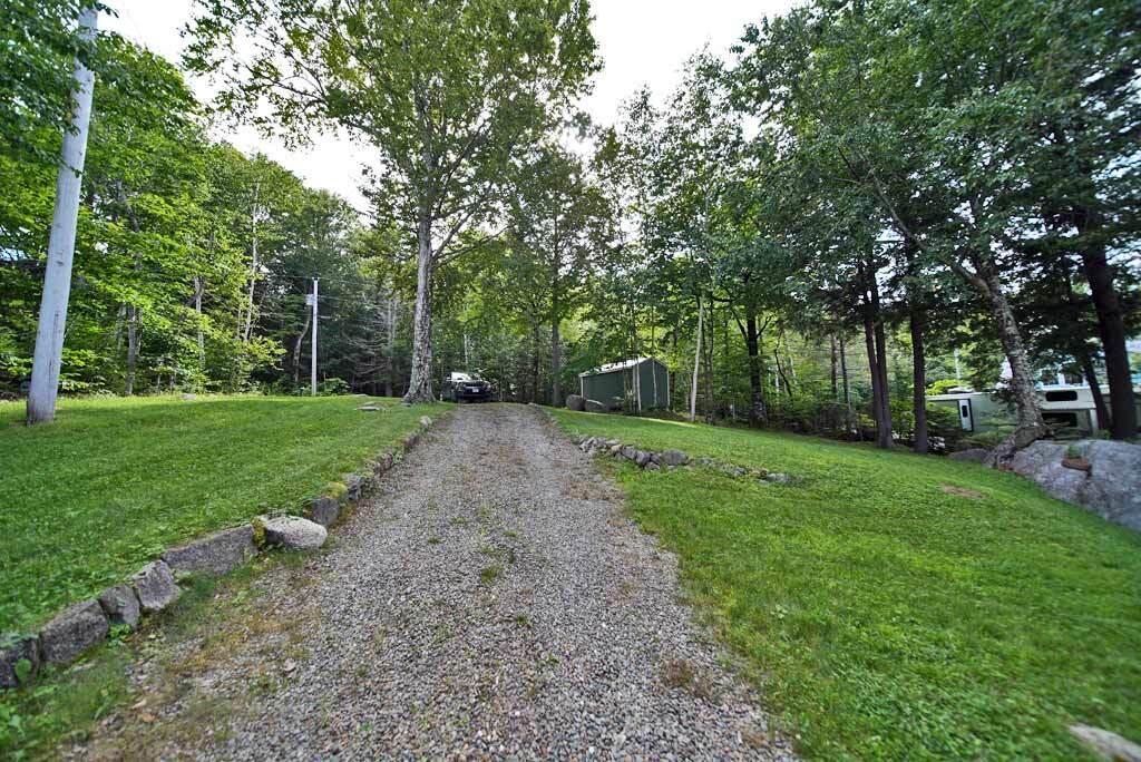 387 Boulder Road Danforth, ME 04424 - Photo 75 of 79 rear-yard-east-grand-lake-1
