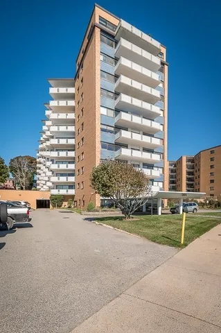 a front view of building with outdoor space