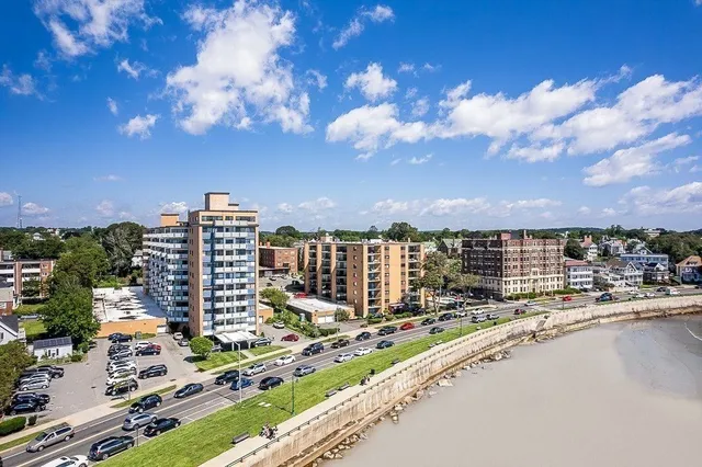 a view of balcony with wooden floor