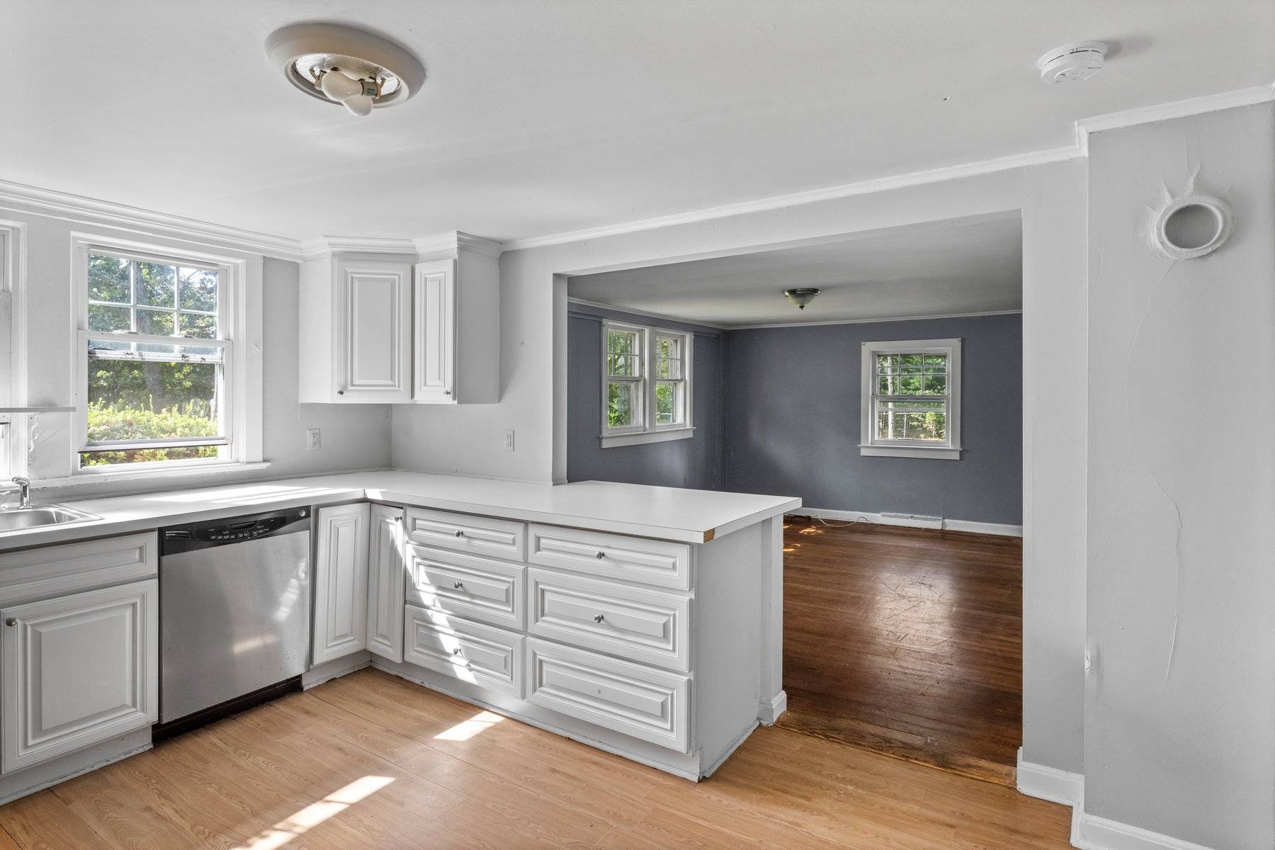 39 Foster Road Quogue, NY 11959 - Photo 11 of 13 a kitchen with a sink and a window