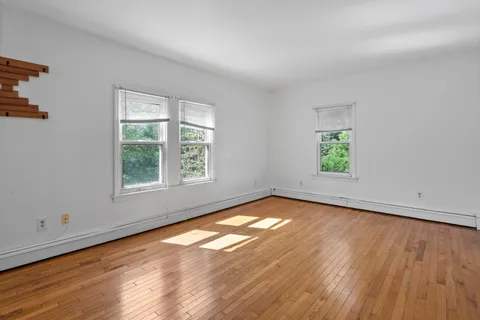 an empty room with window