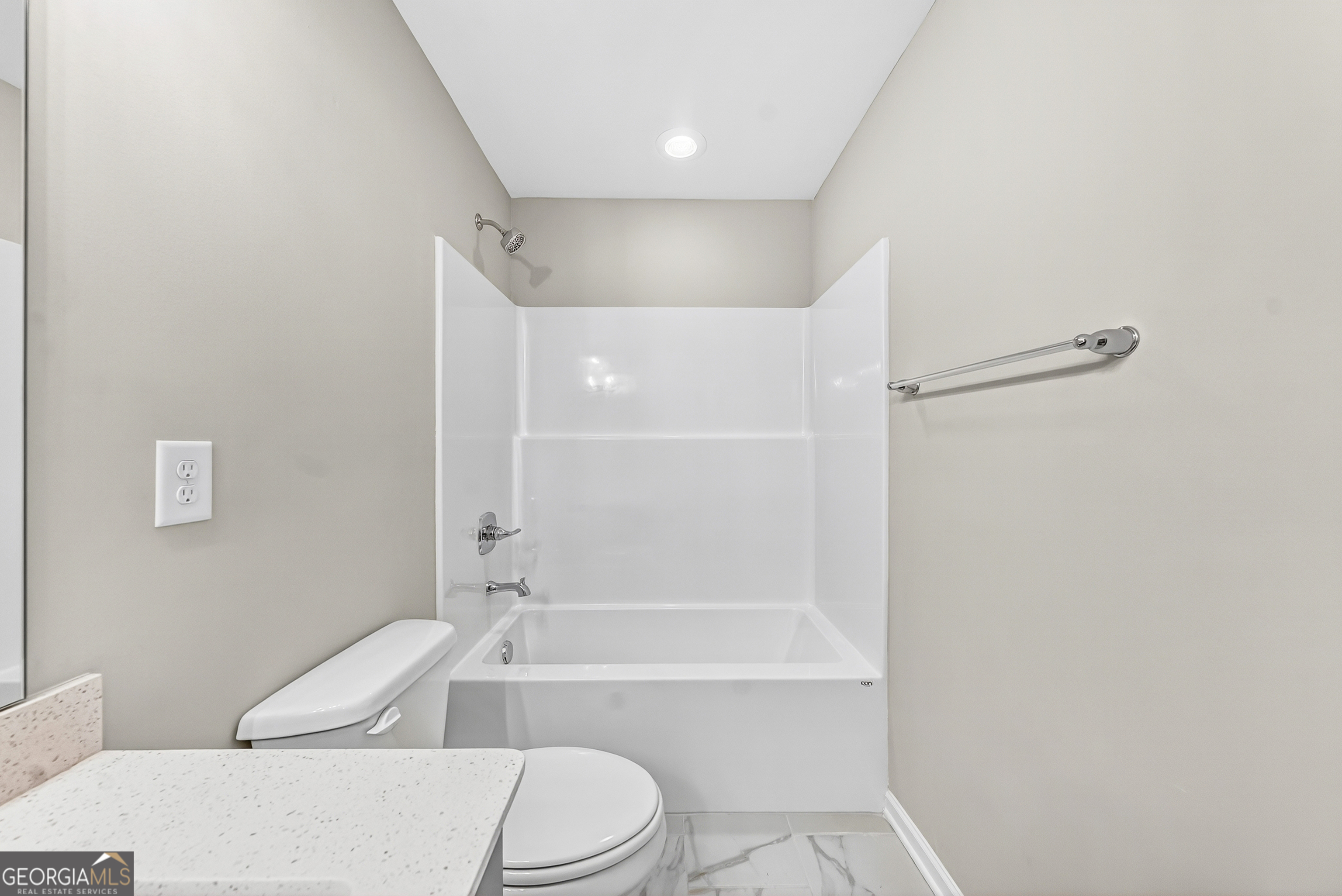 38 Oak Ridge Drive, Unit 26 Waverly Hall, GA 31831 - Photo 28 of 37 a bathroom with a toilet and a bath tub