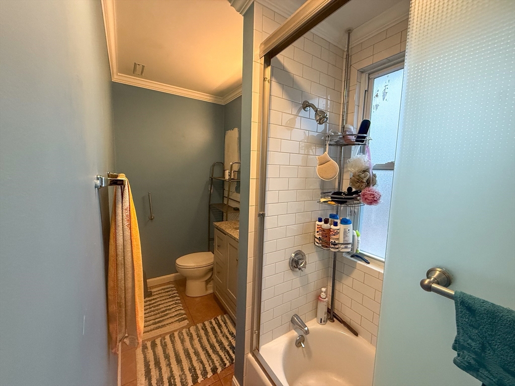 92 Spencer Street Boston, MA 02124 - Photo 18 of 34 a bathroom with a sink and toilet