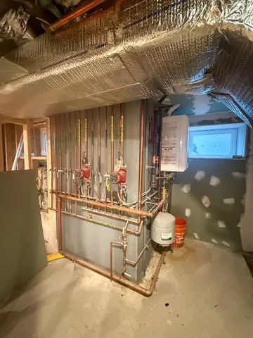 a front view of a house with a large window