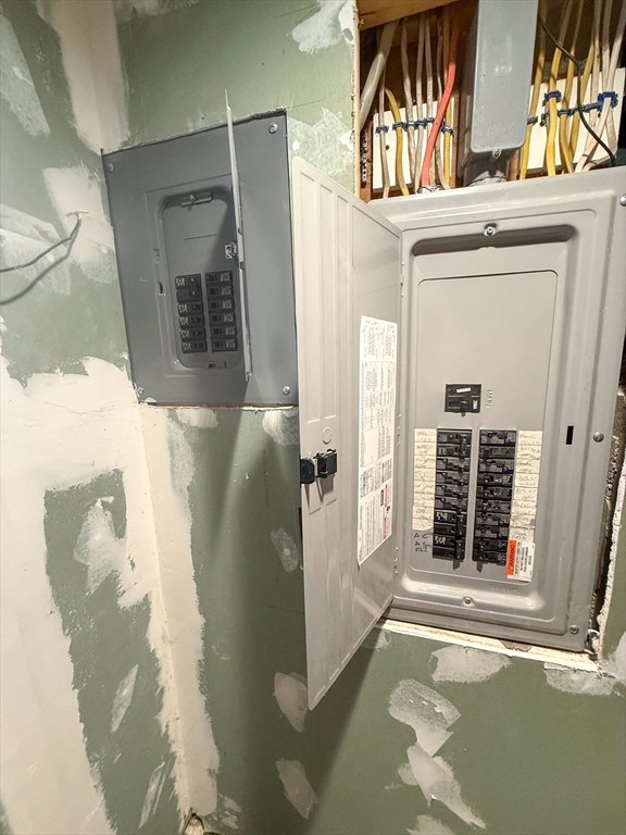 92 Spencer Street Boston, MA 02124 - Photo 30 of 34 a front view of a house with a large window