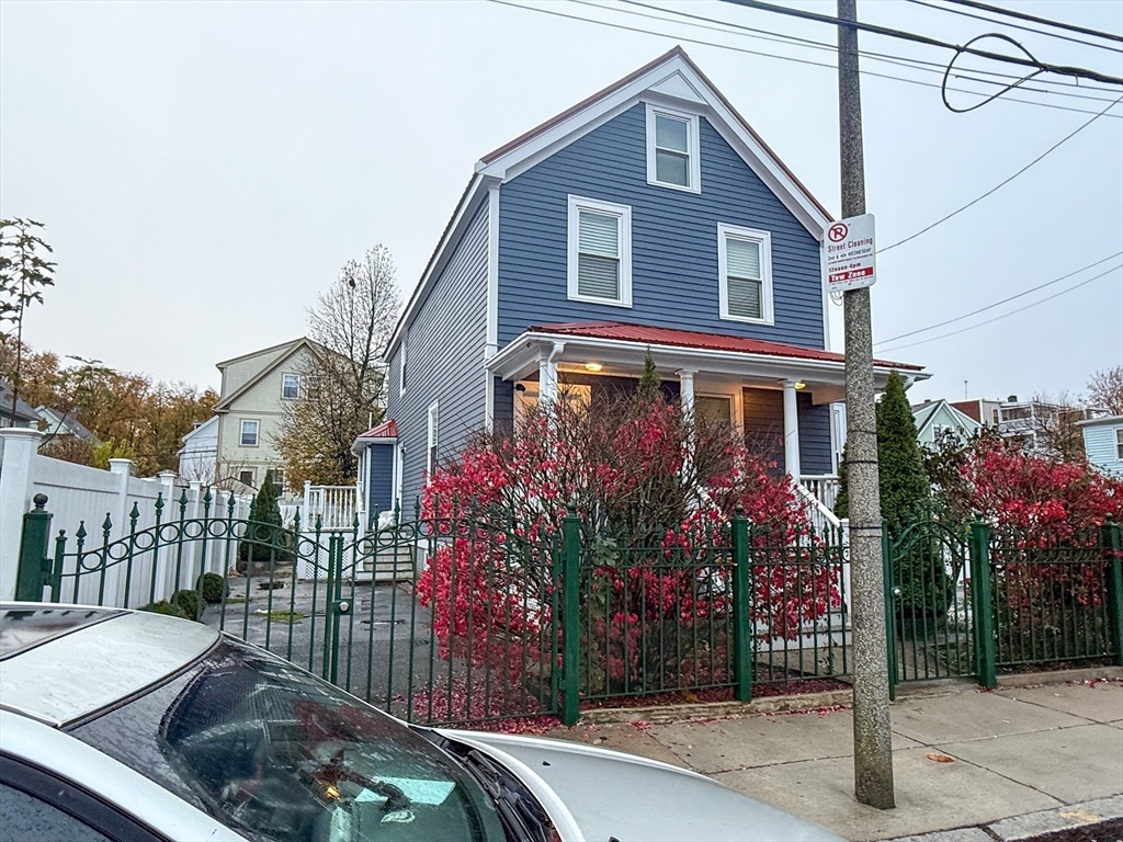92 Spencer Street Boston, MA 02124 - Photo 5 of 34 a front view of a house