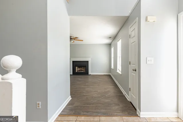 a view of a livingroom from a hallway