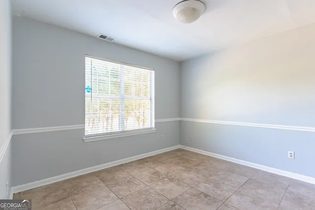 an empty room with a window