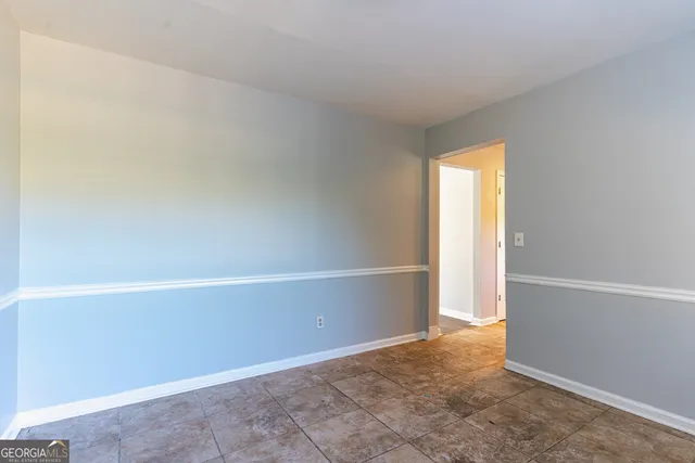 an empty room with an entryway