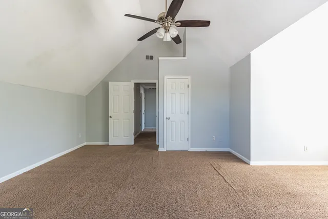 a view of a livingroom with a ceiling fan