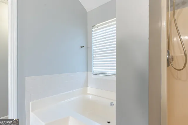 a bathroom with a bathtub