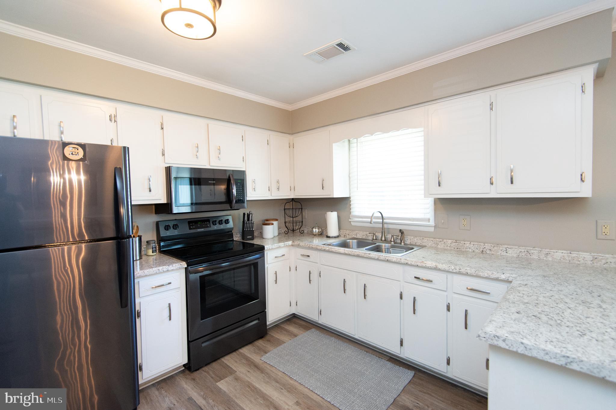 850 Hills Point Road Cambridge, MD 21613 - Photo 9 of 43 Kitchen with new counters & lighting
