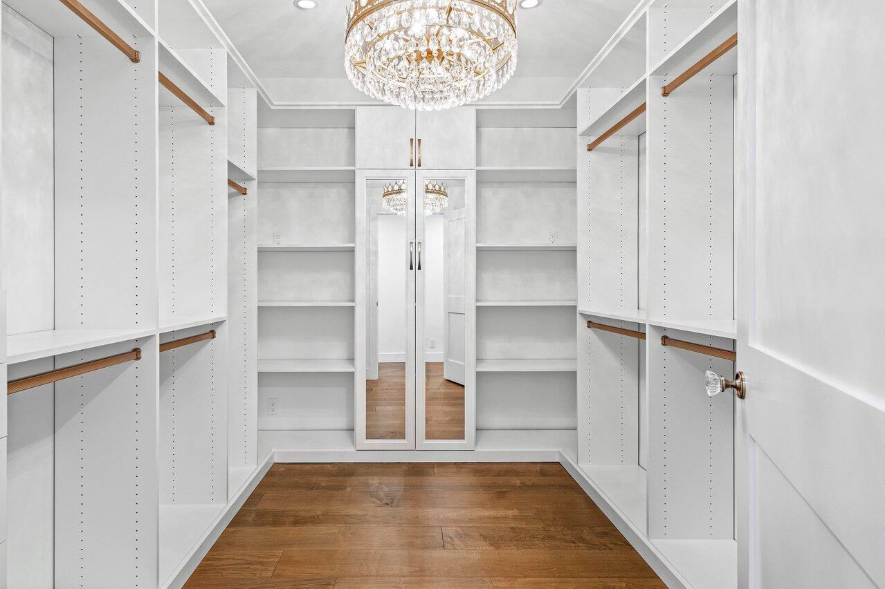 17270 Rocky Pines Road Jupiter, FL 33478 - Photo 28 of 69 a view of walk in closet with empty racks