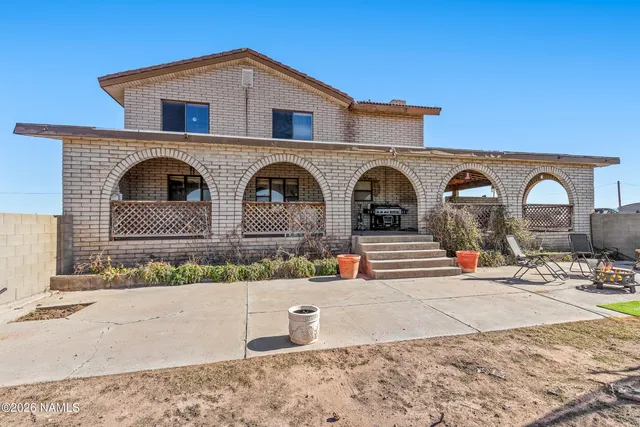a bedroom with a bed furniture and a window
