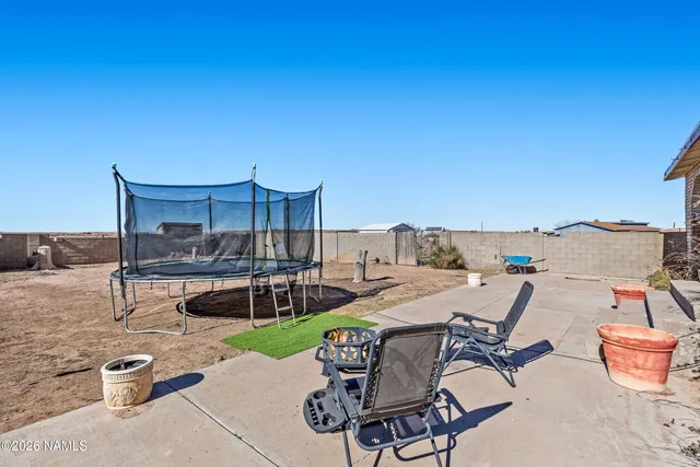 a bedroom with a bed and a cabinets