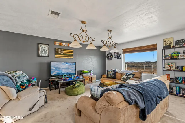 a bathroom with a toilet a sink and a mirror