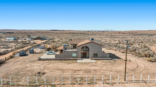 a view of a house with a snow