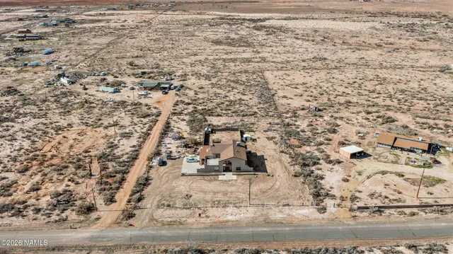 a view of entryway with a potted plant and stairs