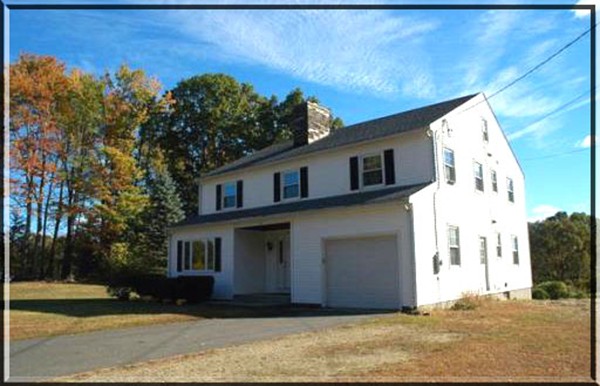 32 Mine Road Westhampton, MA 01027 - Photo 1 of 24 a view of a house with a yard