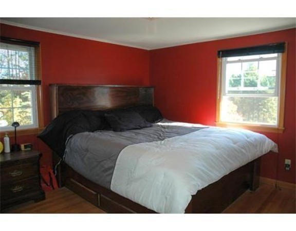 32 Mine Road Westhampton, MA 01027 - Photo 17 of 24 a bedroom with a bed window and a night stand