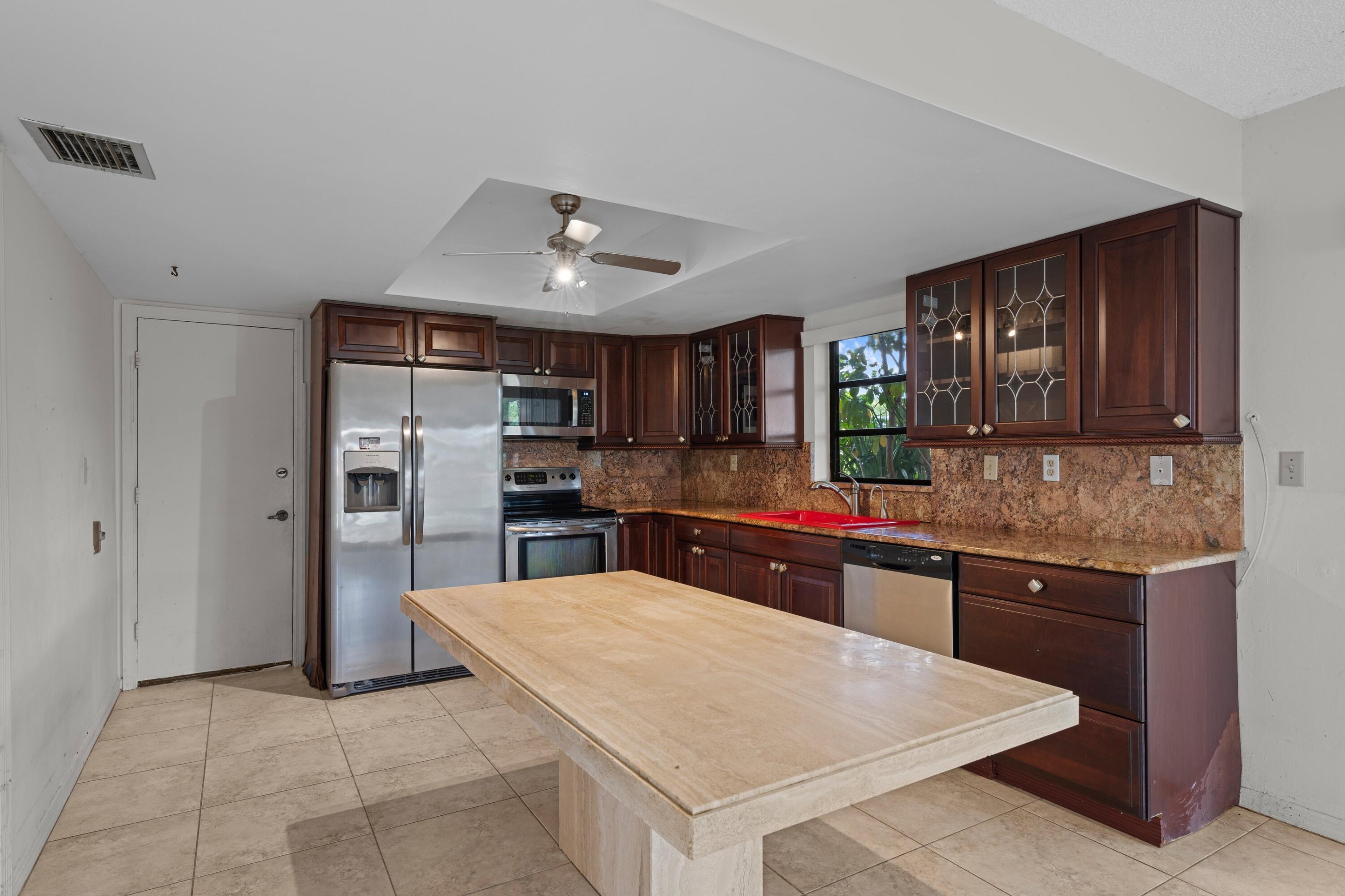 392 Northwest 42nd Street Boca Raton, FL 33431 - Photo 4 of 24 Kitchen Island