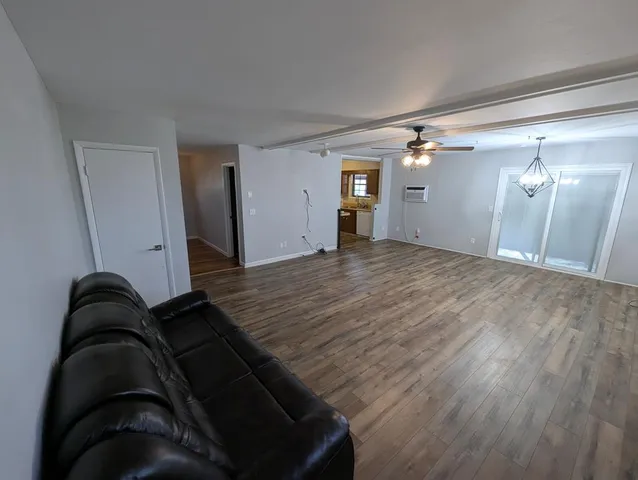 a room with storage and racks on wall