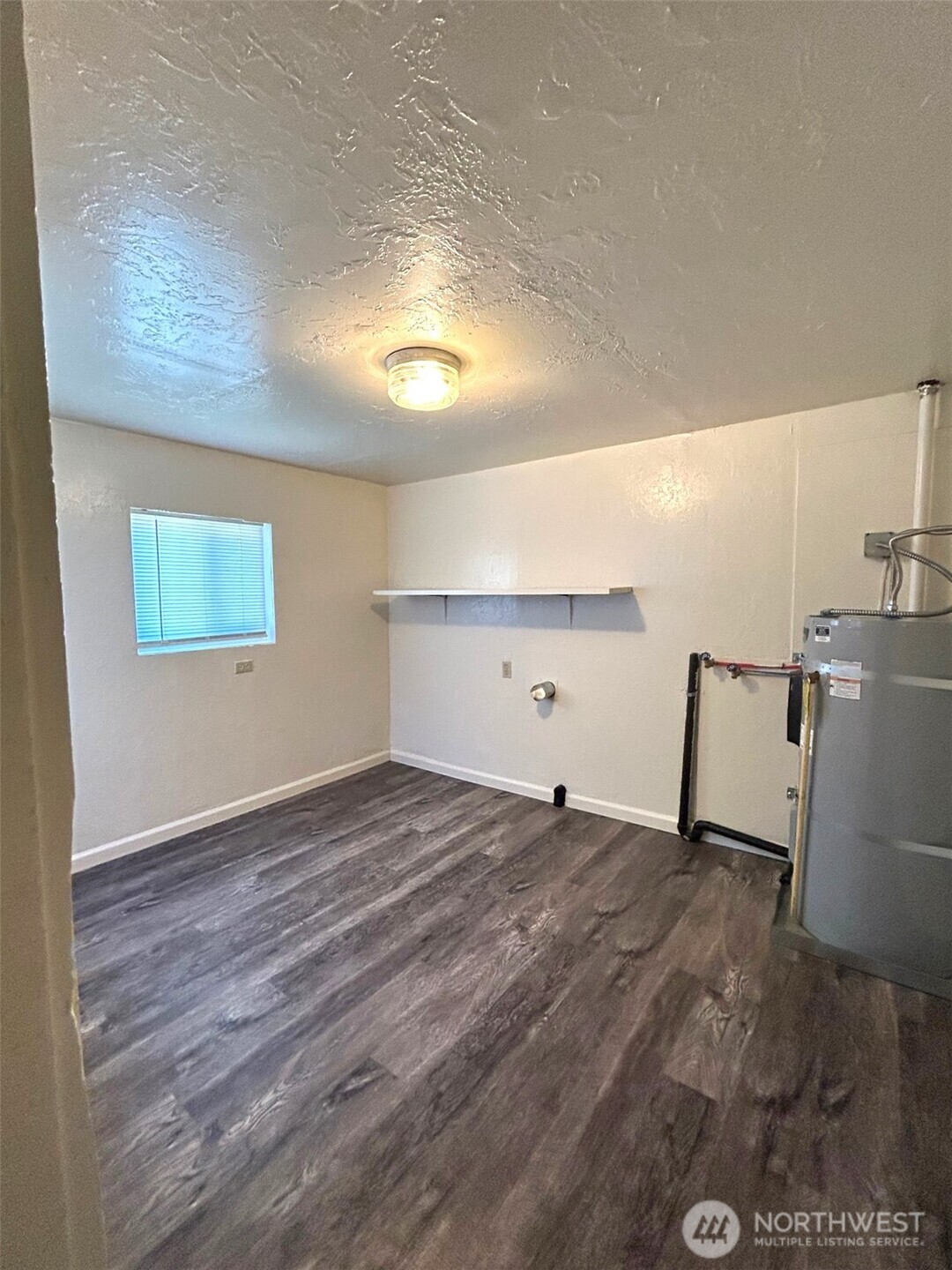 2914 Washington Way Longview, WA 98632 - Photo 13 of 17 a view of a room with wooden floor and a sink
