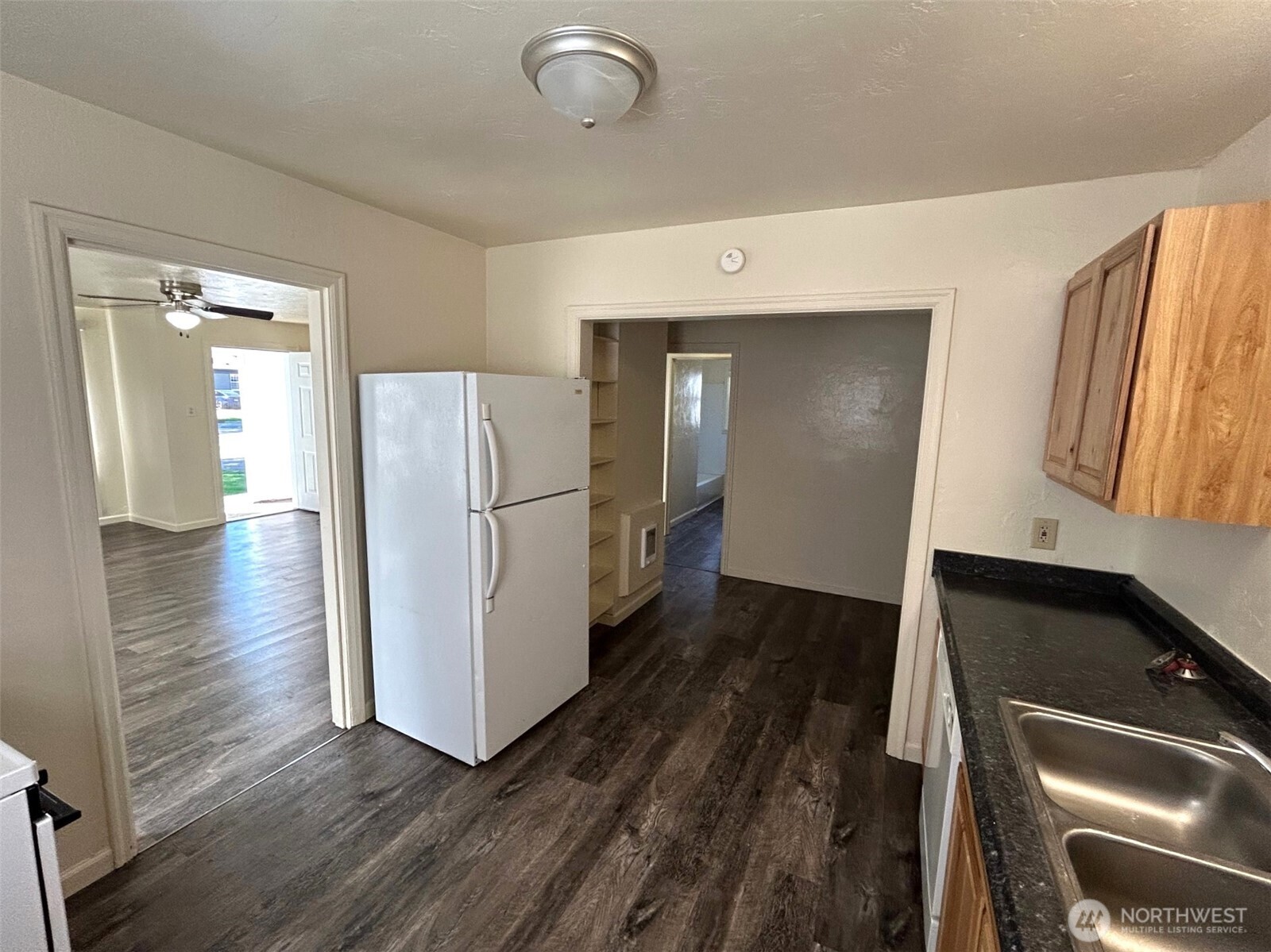 2914 Washington Way Longview, WA 98632 - Photo 5 of 17 a kitchen with wooden floor