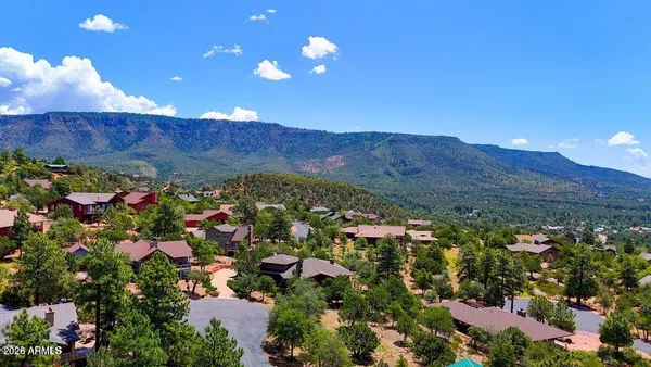 an aerial view of house with outdoor space