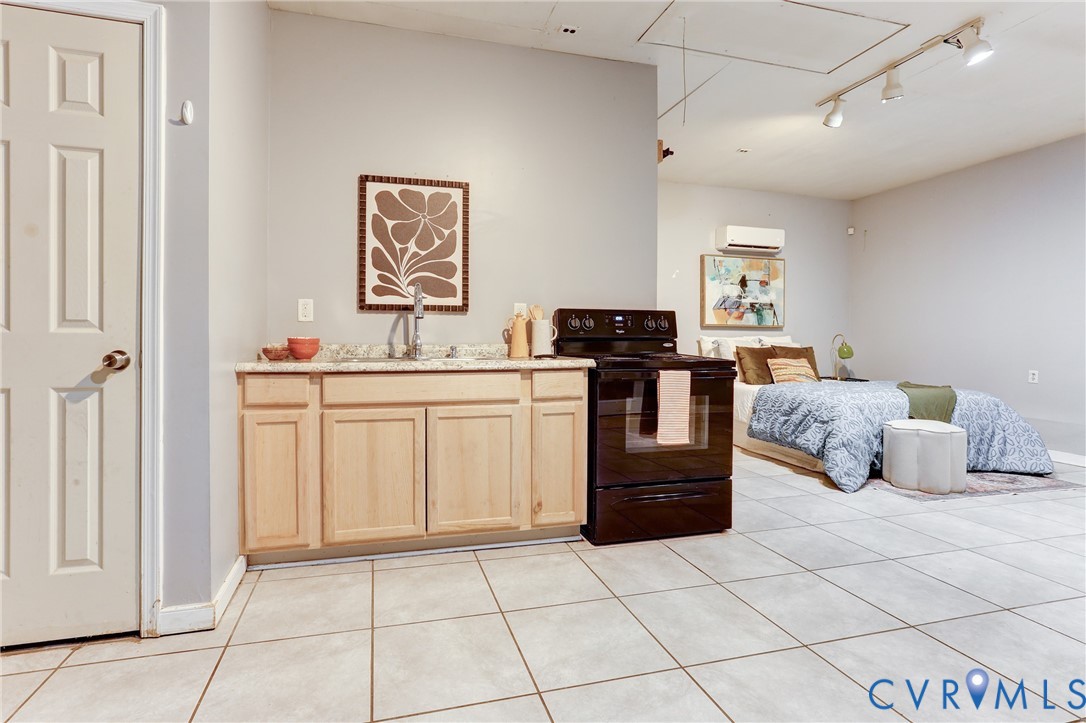 661 Greencastle Road Chesterfield, VA 23236 - Photo 25 of 28 a bedroom with a bed and a cabinets