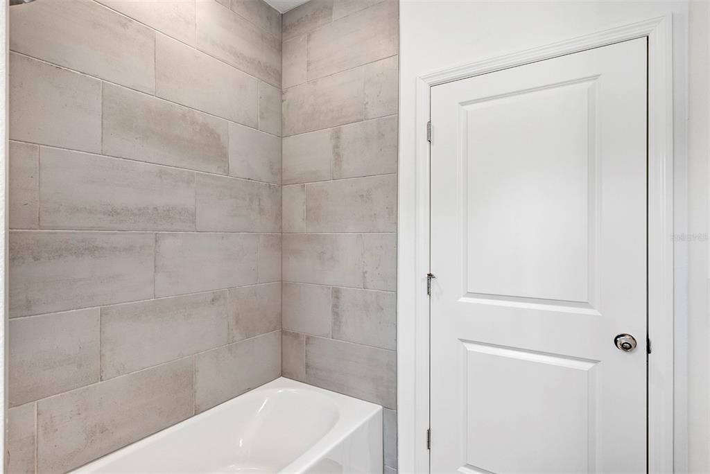 19438 Southwest 79th Street Dunnellon, FL 34432 - Photo 16 of 34 a bathroom with a shower and a sink