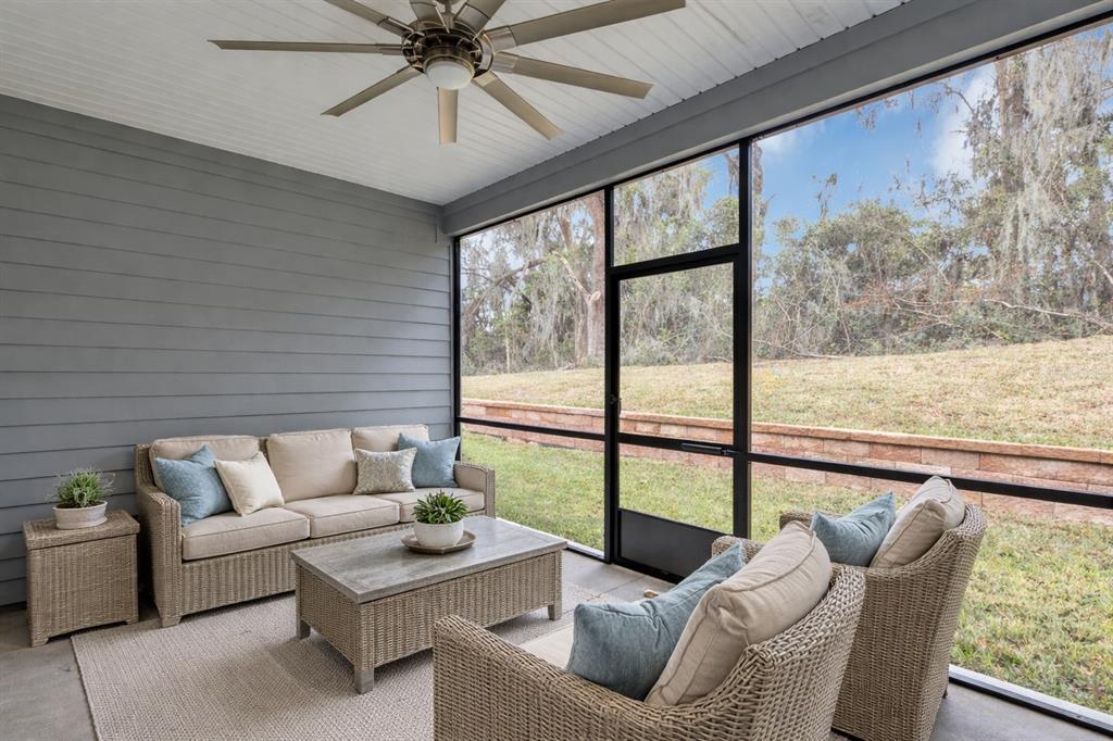 19438 Southwest 79th Street Dunnellon, FL 34432 - Photo 19 of 34 a living room with furniture and a large window
