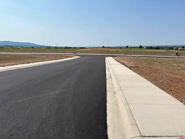 a picture of a bathroom with a shower