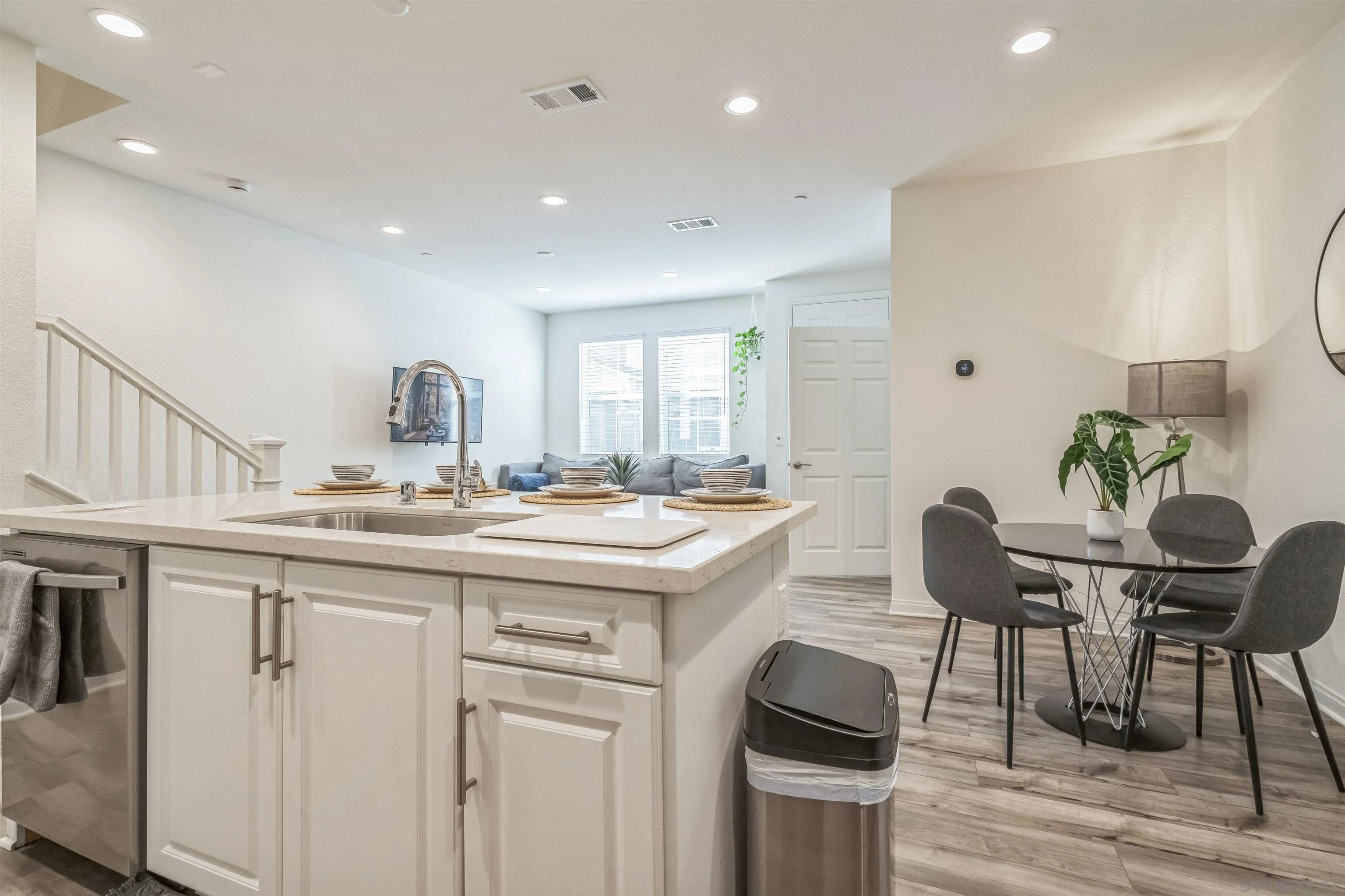2018 Barite Street Spring Valley, CA 91977 - Photo 41 of 47 a kitchen with a sink and chairs