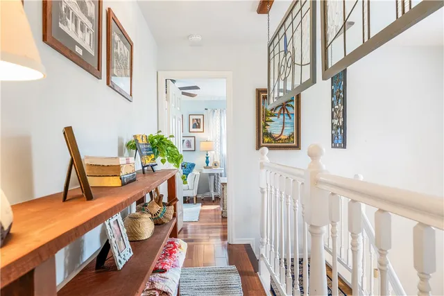 a kitchen with a refrigerator and a stove