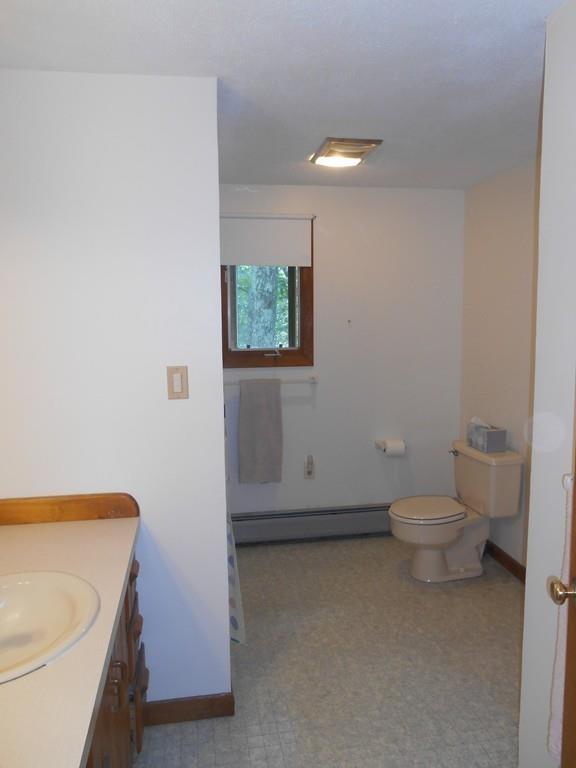 12 Birch Bluff Road Montgomery, MA 01085 - Photo 24 of 37 a bathroom with a toilet a sink and a bathtub