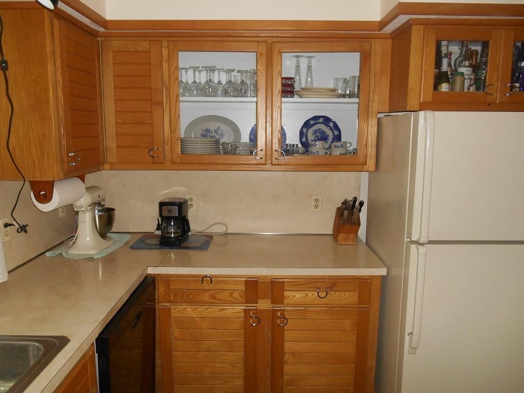 12 Birch Bluff Road Montgomery, MA 01085 - Photo 5 of 37 a kitchen with a refrigerator and a sink