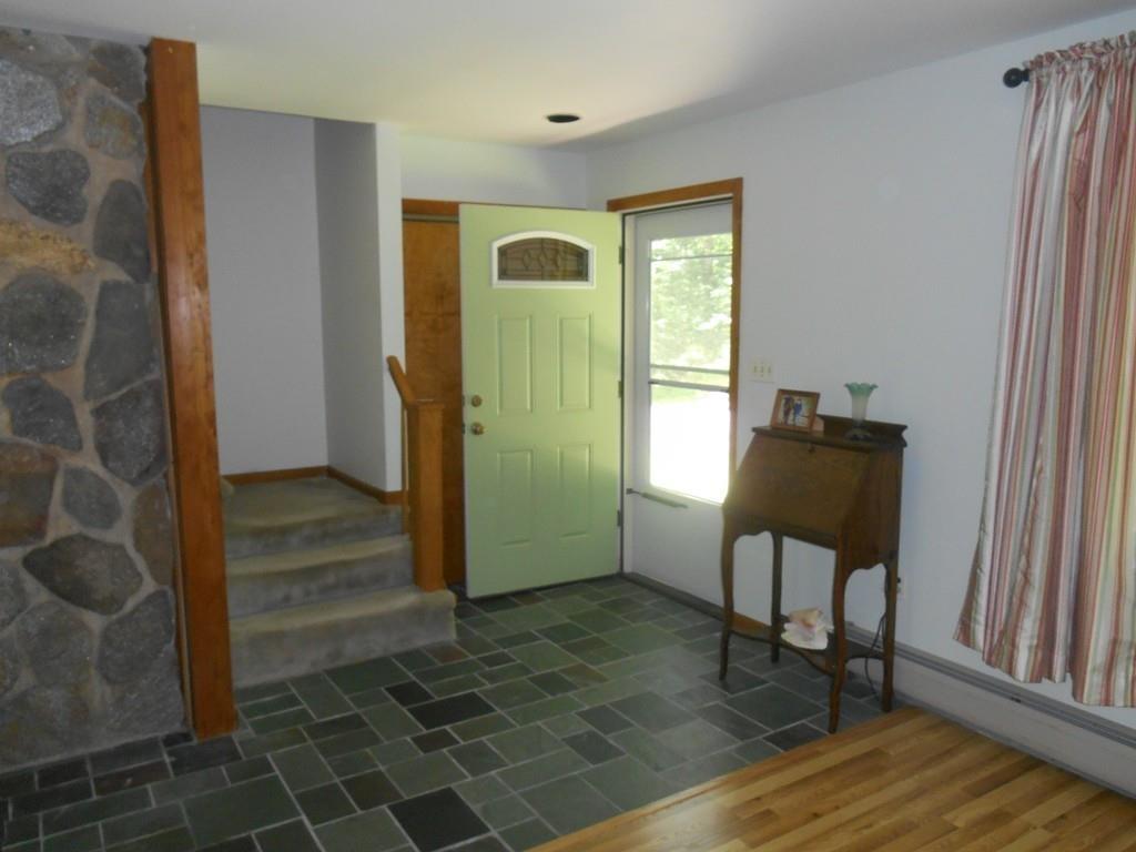12 Birch Bluff Road Montgomery, MA 01085 - Photo 10 of 37 a view of a hallway with wooden floor and a entryway