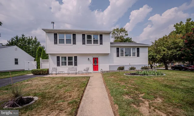a front view of house with yard