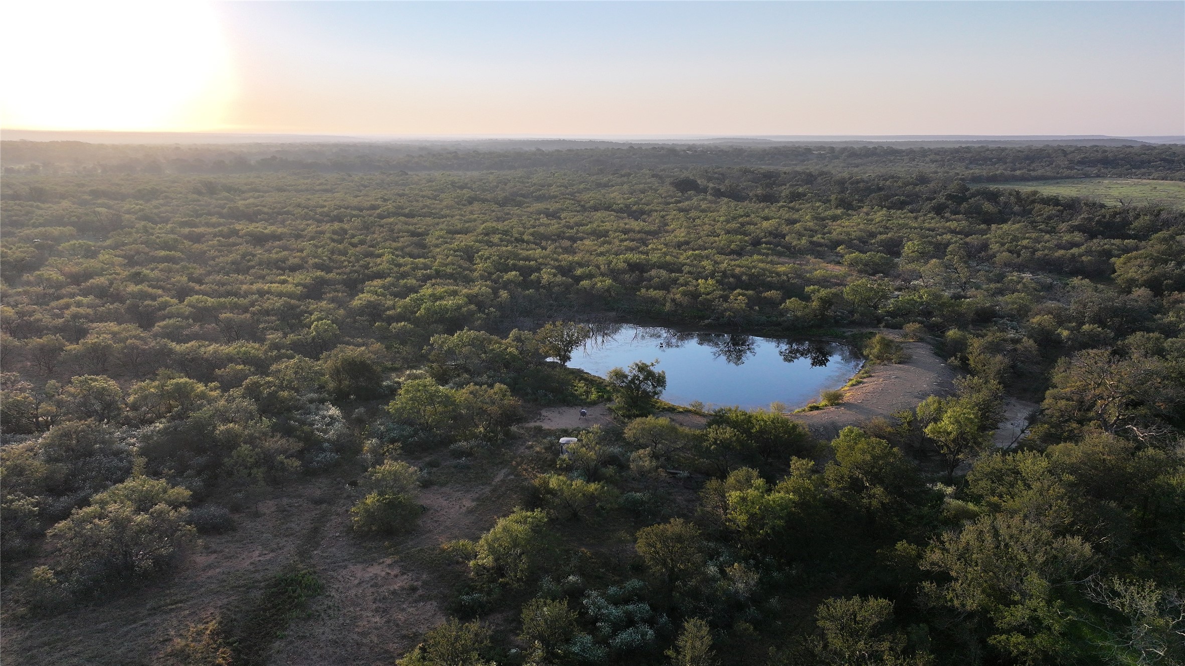 392 County Road 230 San Saba, TX 76877 - Photo 14 of 40 a view of a lake with a city