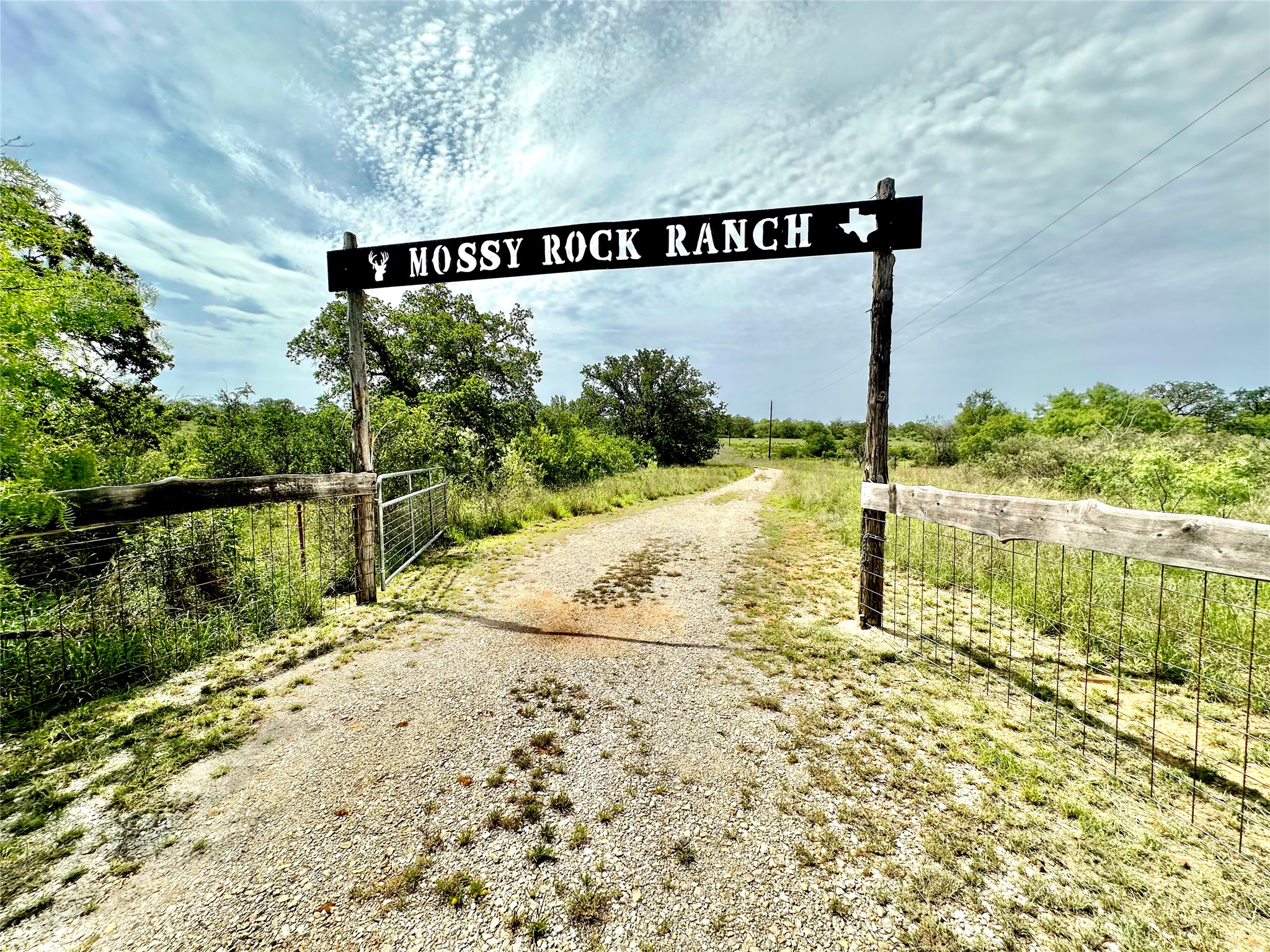 392 County Road 230 San Saba, TX 76877 - Photo 15 of 40 a sign board with yard in the back