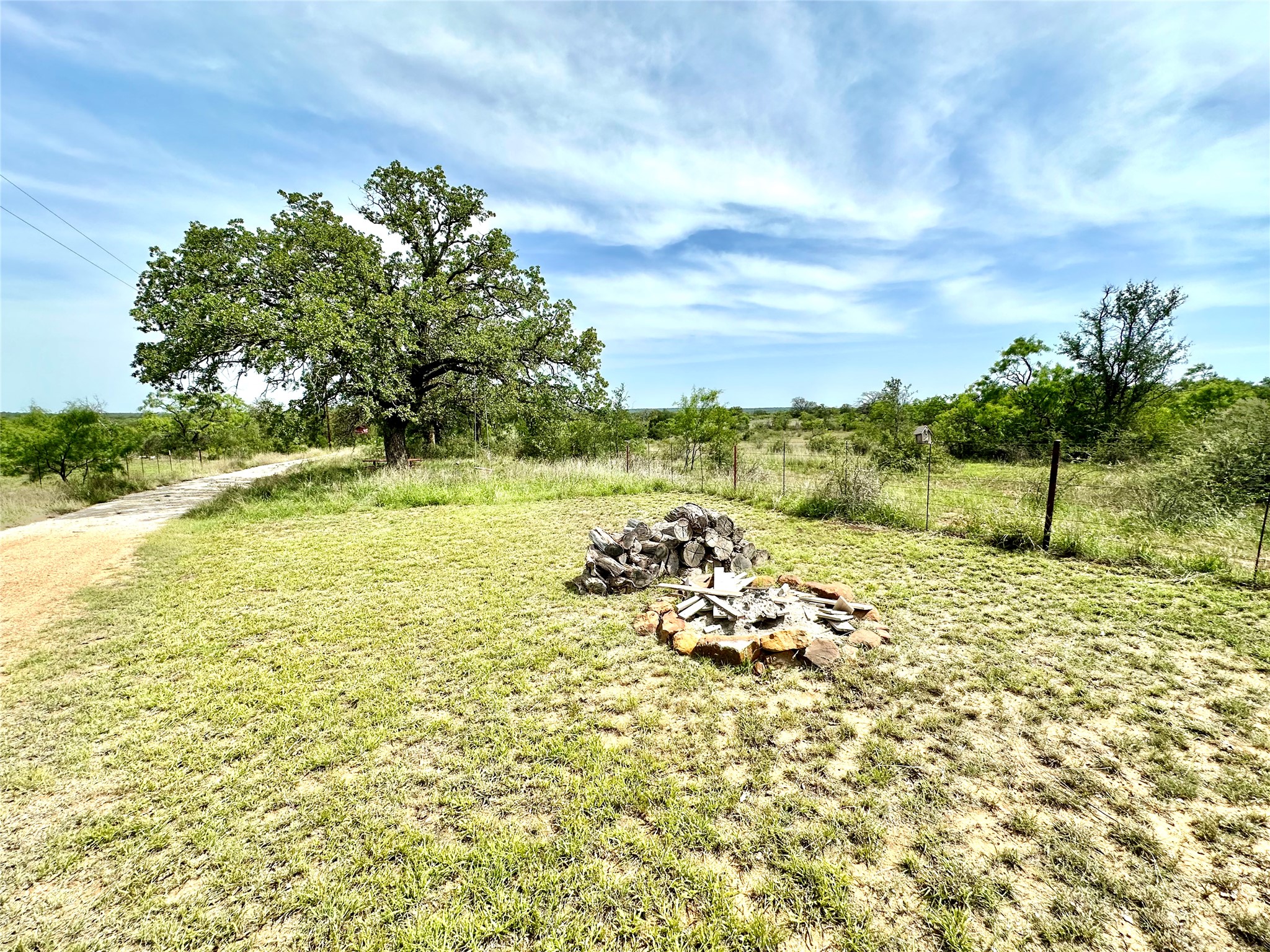 392 County Road 230 San Saba, TX 76877 - Photo 30 of 40 a view of a lake with a yard
