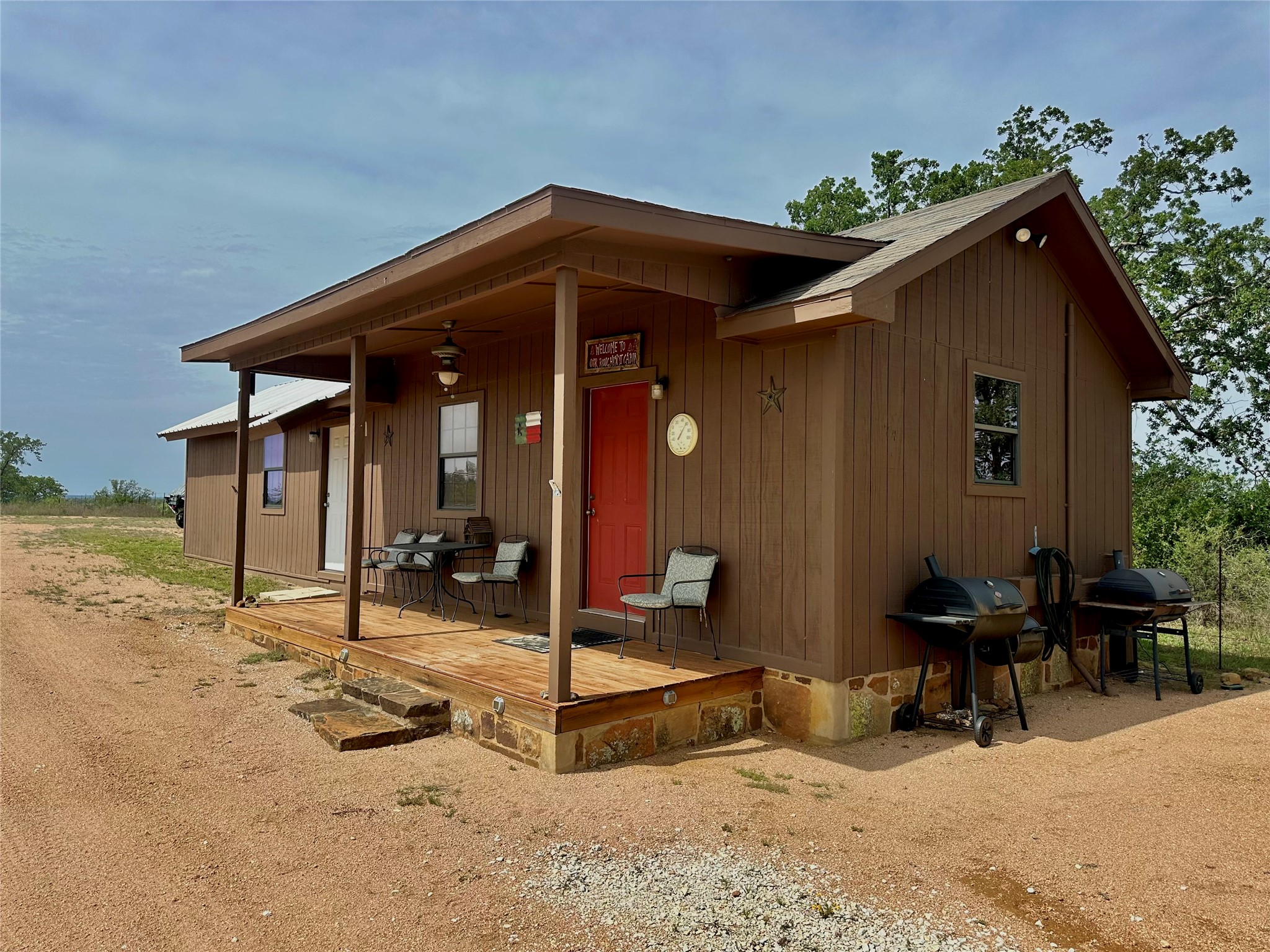 392 County Road 230 San Saba, TX 76877 - Photo 32 of 40 a backyard of a house with table and chairs