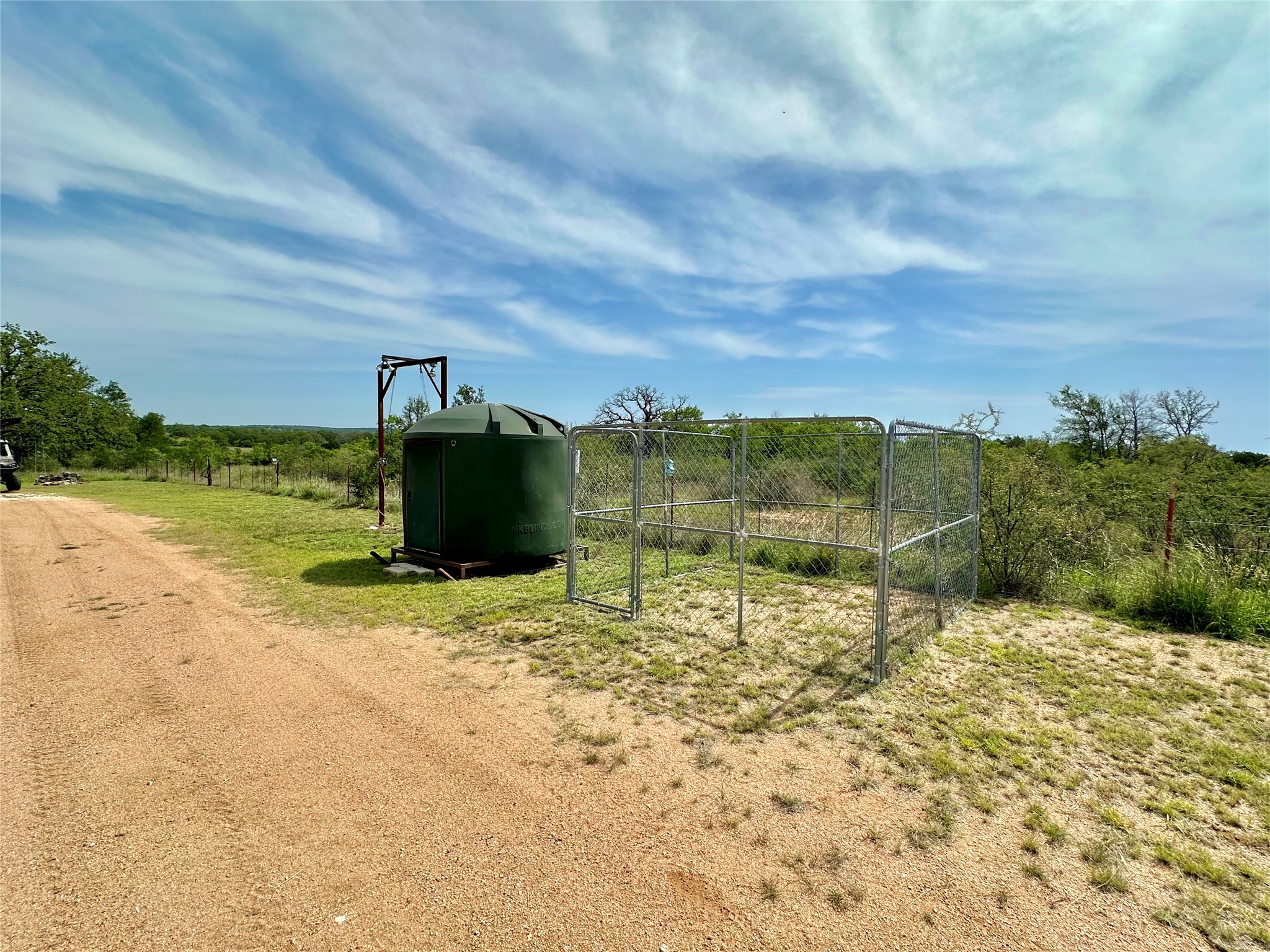 392 County Road 230 San Saba, TX 76877 - Photo 39 of 40 a view of a dry yard with wooden fence