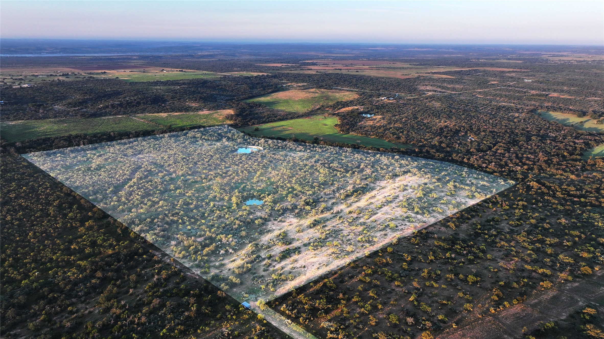 392 County Road 230 San Saba, TX 76877 - Photo 5 of 40 a view of a sky from a yard
