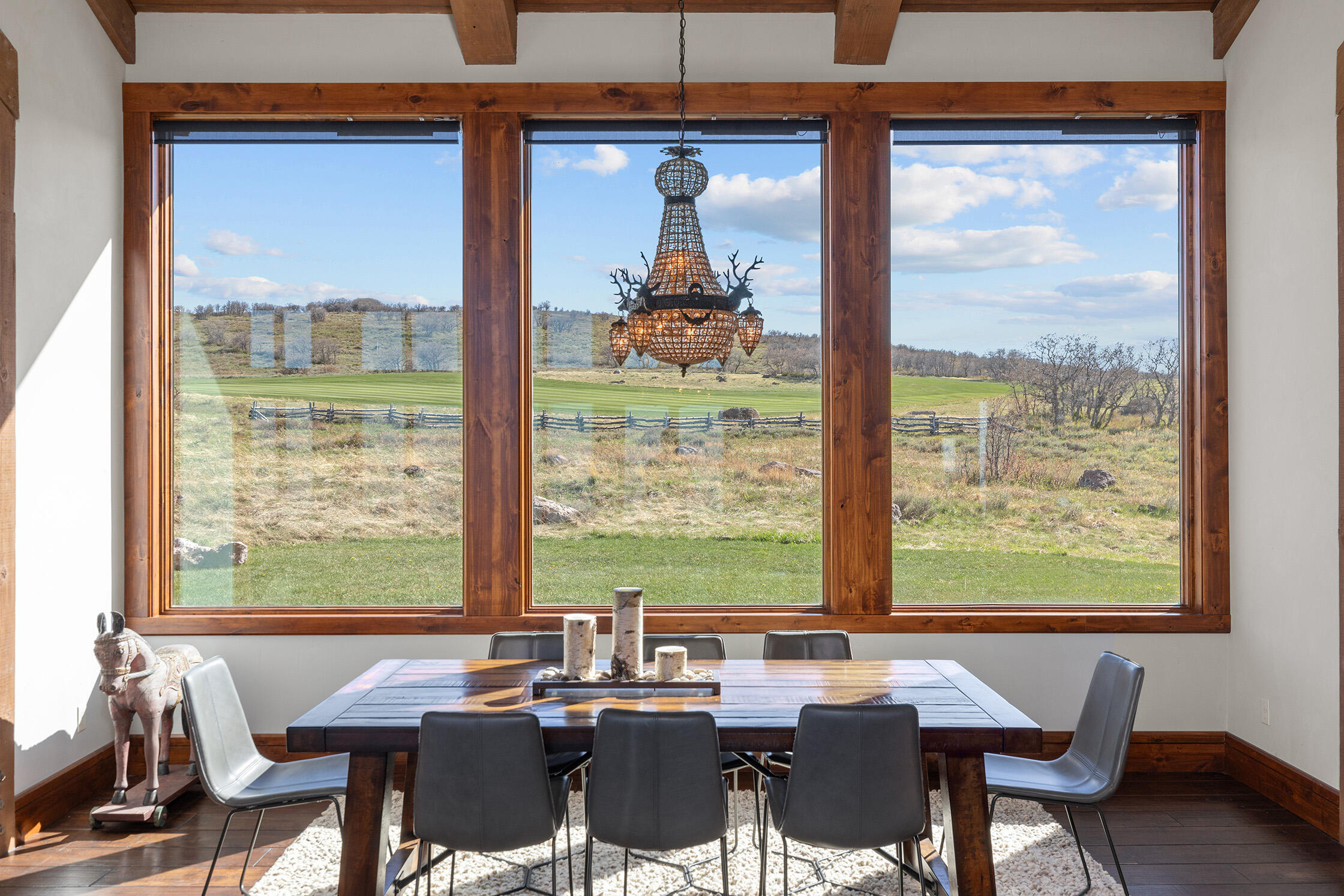 1221 Cornerstone Loop Montrose, CO 81403 - Photo 15 of 44 a view of a dining room with furniture window and outside view