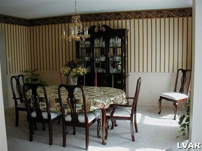 4985 Harvey Road Bethlehem, PA 18020 - Photo 7 of 8 Tastefully decorated and inviting dining room. Great for large gatherings.