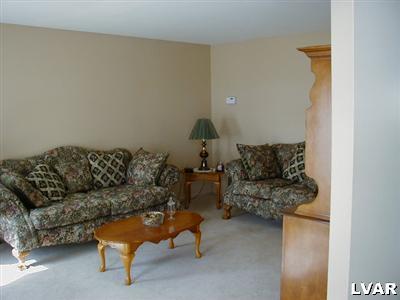 4985 Harvey Road Bethlehem, PA 18020 - Photo 8 of 8 Large formal living room with newer carpeting.